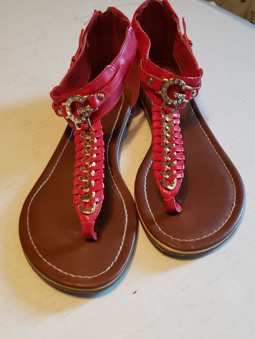 Guess Red T-Strap Gladiator Sandals with Gold 'G' Accent